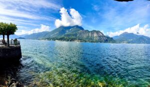 Panoramic lake with mountains and promenade