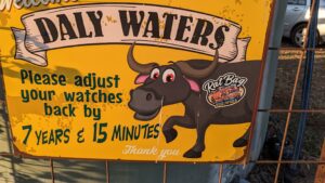 Yellow Daly Waters sign with cartoon buffalo